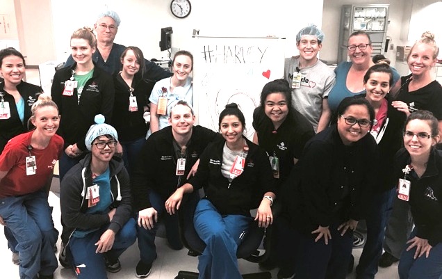 Nurse Vi Dioneda, second from right front row, stayed in her hospital as Hurricane Harvey battered Houston, Texas. CONTRIBUTED
