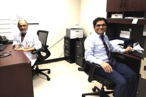 Dr. Farooq Habib (left) and Dr. Muhammad Tauseef share an office at Los Barrios Unidos Community Clinic in Dallas, Texas. They’re both from Pakistan and have both worked as pediatricians in medically underserved areas in the U.