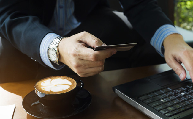 Person holding credit card