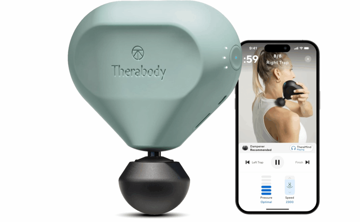 Theragun Mini 2nd Gen percussive massage device next to smartphone app
