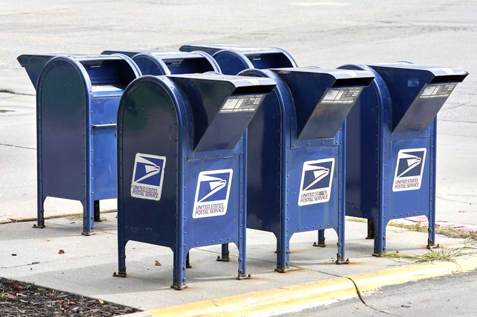 US Postal Service halts some changes amid outcry, lawsuits