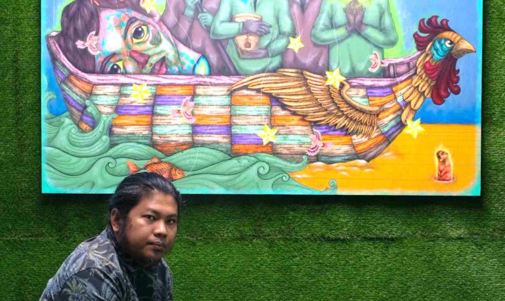 Patrick Fernandez in Regina's Art NOW with is main piece, “Punla sa Bagong Simula,” (Seed of a New Beginning). CONTRIBUTED