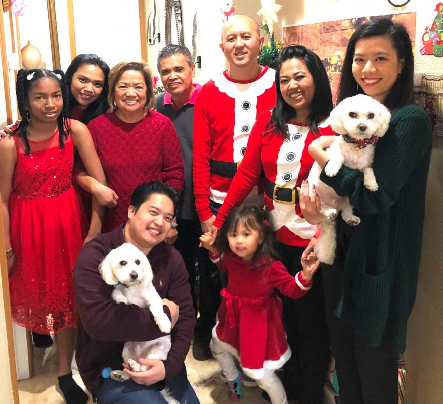Chris Lozano is proud of his multiracial family, from left foreground: his son Christopher, granddaughter Leyla Trinh; standing:  granddaughter Alana Williams, daughter Loreta Lozano, wife Teresita, son-in-law James Trinh, daughter Lorinda and future daughter-in-law Rachel Van.  CONTRIBUTED