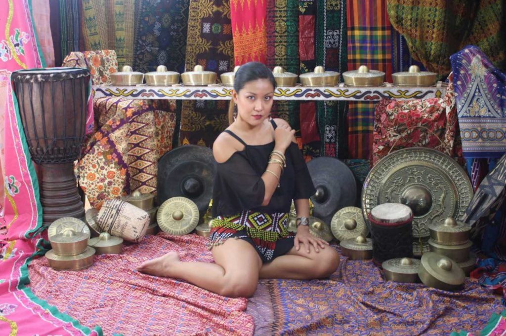 Lydia Querian with some of her Daily Malong merchandise. JAE TIOSECO