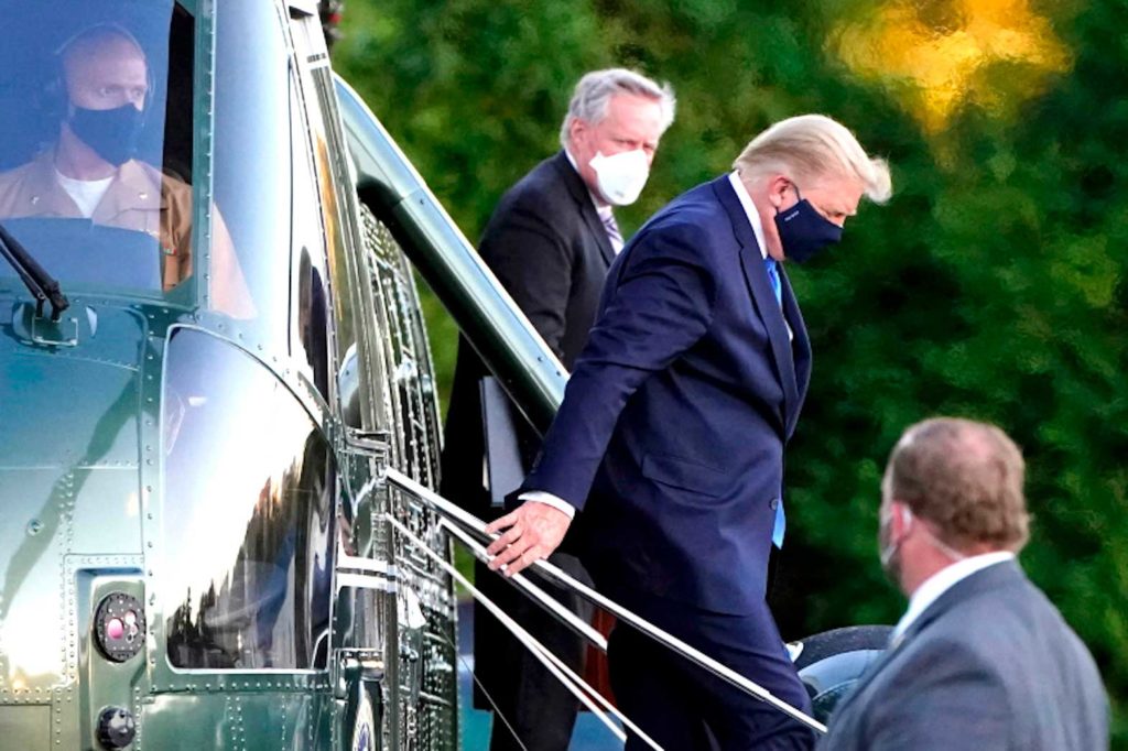 President Donald Trump on his way to Walter Reed Hospital after testing positive for coronavirus. AP