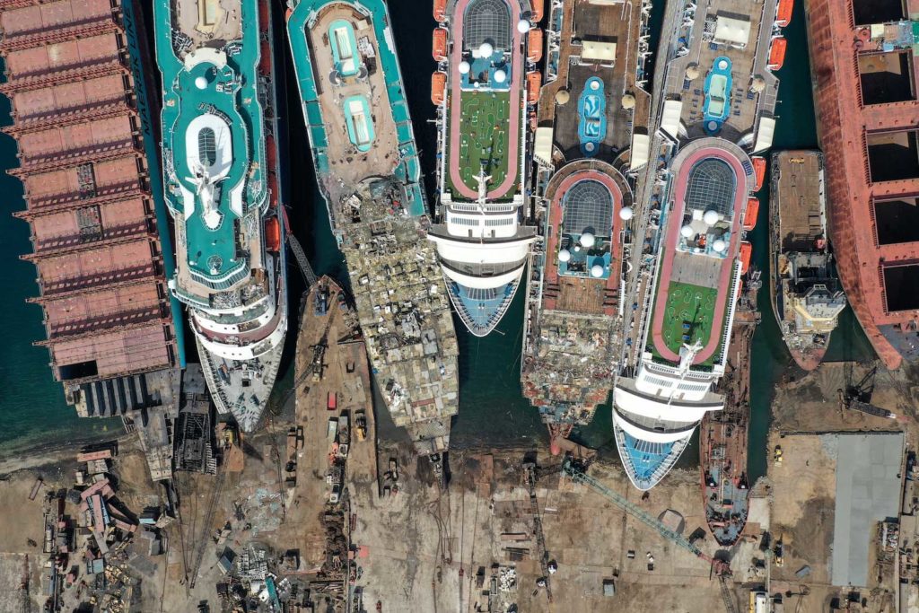 A drone image shows decommissioned cruise ships being dismantled at Aliaga ship-breaking yard in the Aegean port city of Izmir, western Turkey, October 2, 2020. REUTERS/Umit Bektas/File Photo