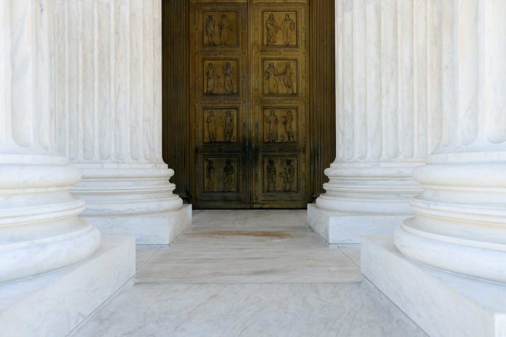 A general view shows the front doors of the U.S. Supreme Court building the day after Election Day as results are still being counted and election-related lawsuits are expected to make their way through the court system in Washington, U.S. November 4, 2020. REUTERS/Jonathan Ernst