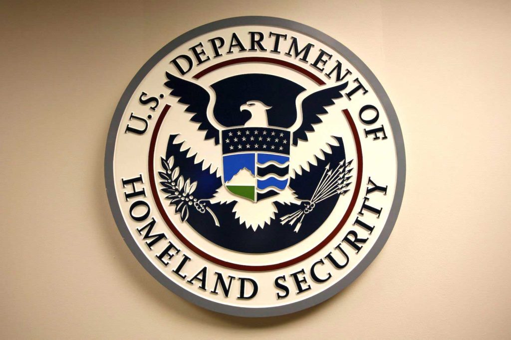 U.S. Department of Homeland Security emblem is pictured at the National Cybersecurity & Communications Integration Center (NCCIC) located just outside Washington in Arlington, Virginia September 24, 2010. REUTERS/Hyungwon Kang/File Photo