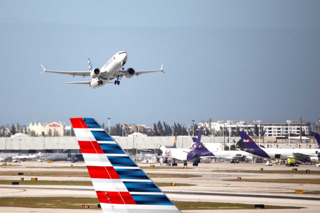 American Airlines flight 718, the first U.S. Boeing 737 MAX commercial flight since regulators lifted a 20-month grounding in November, takes off from Miami, Florida, U.S. December 29, 2020. REUTERS/Marco Bello