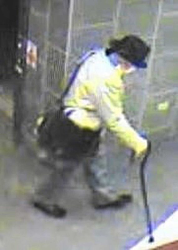 In January 2017, police released pictures of the footage from security videos on Dec. 7, 2016, showing a man who was wearing a trench coat, surgical mask and hat, and carrying a cane, entering the building at 1363 Shermer Road, Northbrook, IL. Police said the man in disguise is John Panaligan, the suspect in the murder of Jigar K. Patel. (Northbrook Police Department / HANDOUT)