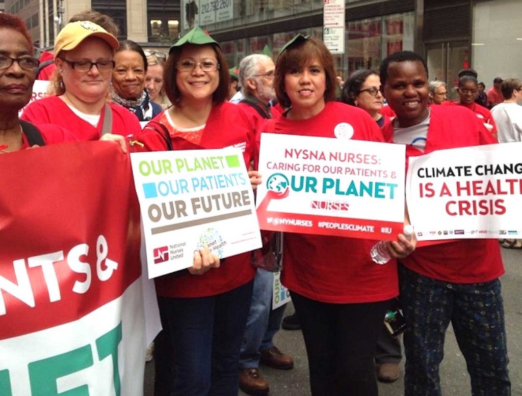Femarie Clarete-Bedona (center) joins the People’s Climate March with fellow members from the New York State Nurses Association. CONTRIBUTED 