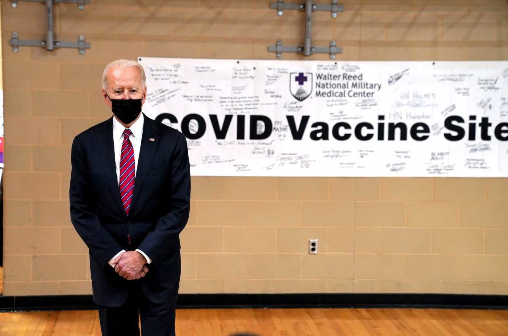 U.S. President Joe Biden visits a coronavirus disease (COVID-19) vaccine site during a visit to the Walter Reed National Military Medical Center in Bethesda, Maryland, U.S., January 29, 2021. REUTERS/ Kevin Lamarque