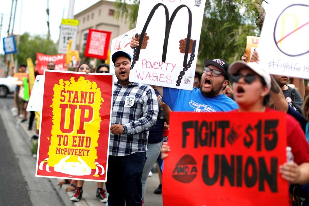 Striking McDonalds workers demanding a $15 minimum wage demonstrate in Las Vegas, Nevada U.S., June 14, 2019. REUTERS/Mike Segar/File Photo