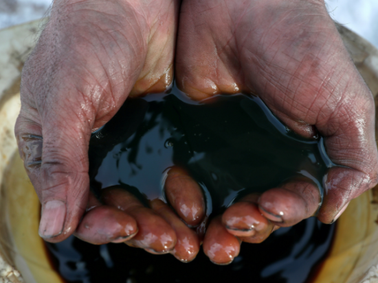 Oil holds near year-long highs as COVID lockdowns seen easing