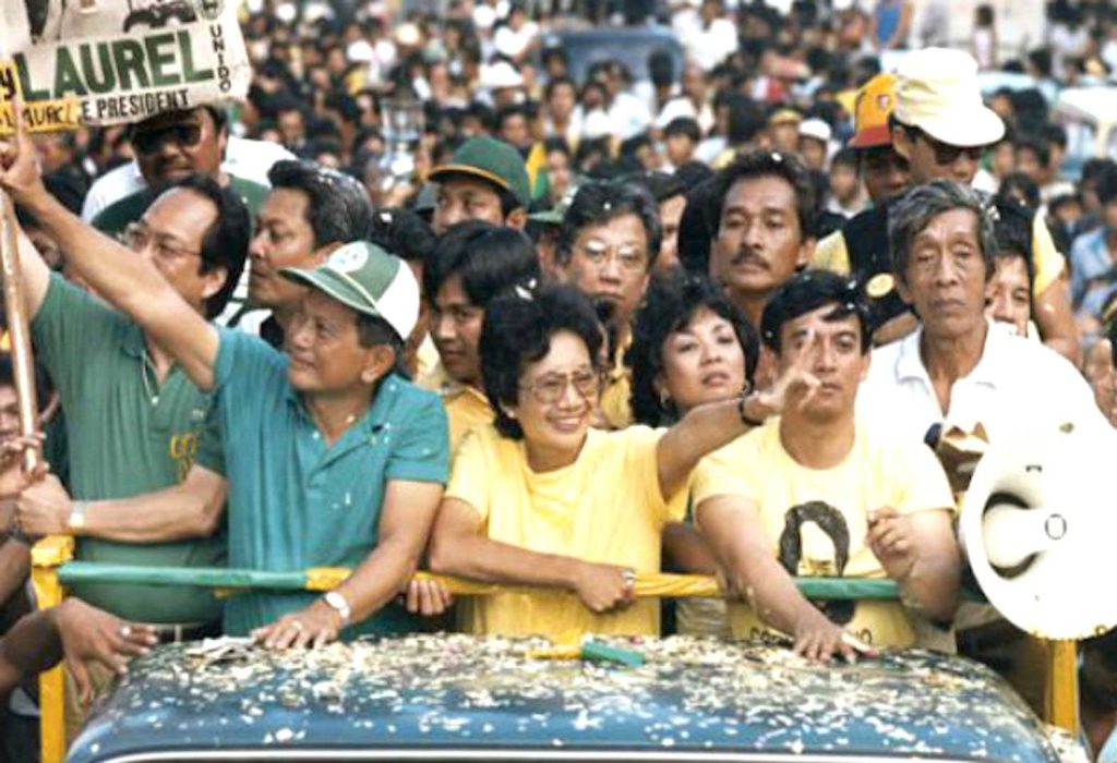  Doy Laurel and Cory Aquino hit the campaign trail to oppose President Marcos (Photo by Erik de Castro/Reuters/Corbis)