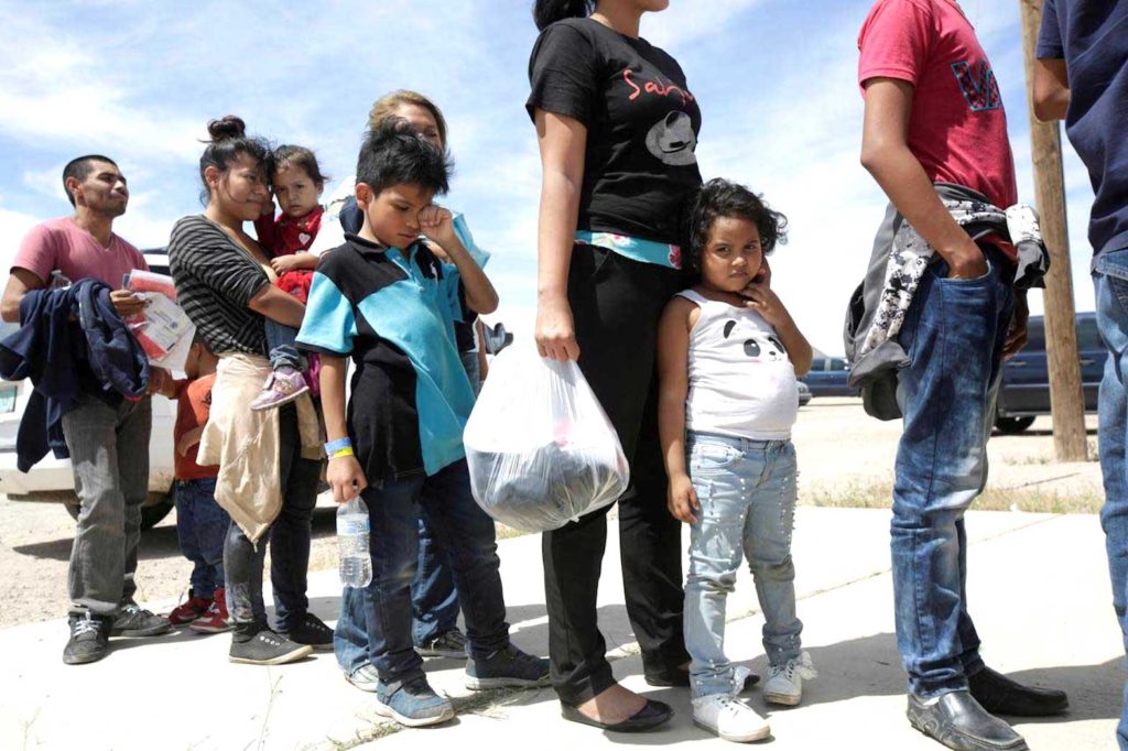 Central American migrants stand in line before entering a temporary shelter, after illegally crossing the border between Mexico and the U.S., in Deming, New Mexico, U.S., May 16, 2019. REUTERS/Jose Luis Gonzalez