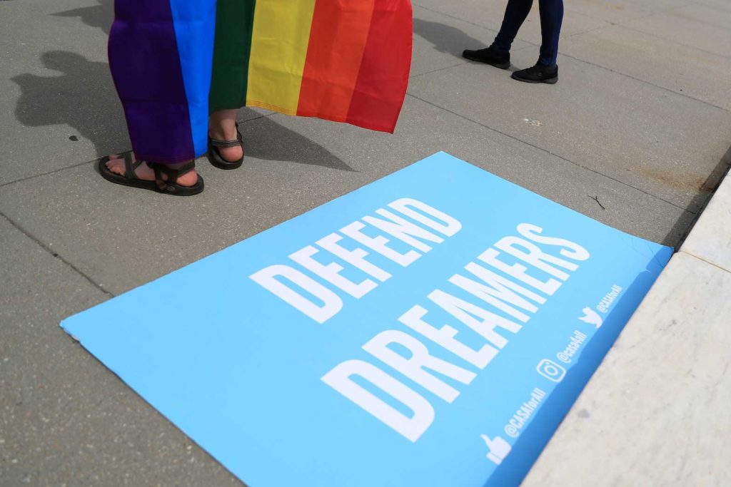 A sign in support of DACA Dreamers lies at the steps of the U.S. Supreme Court after the court declined to hear a Trump administration challenge to California's sanctuary laws, in Washington, D.C., U.S., June 15, 2020. REUTERS/Tom Brenner