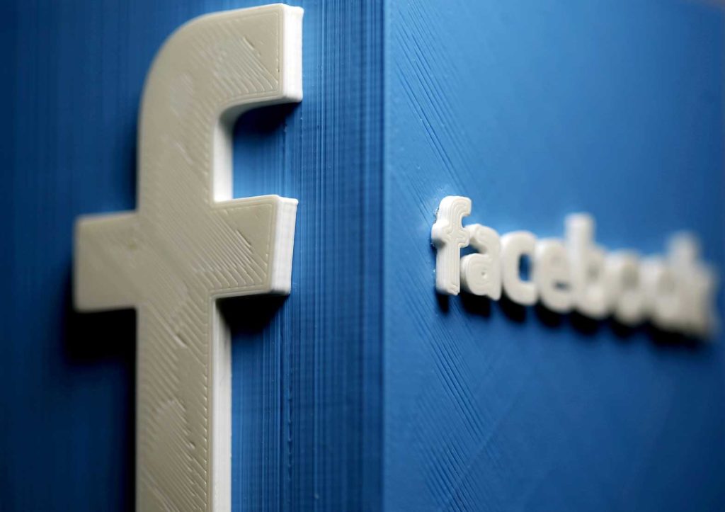 A 3D plastic representation of the Facebook logo is seen in this illustration in Zenica, Bosnia and Herzegovina, May 13, 2015. REUTERS/Dado Ruvic//File Photo