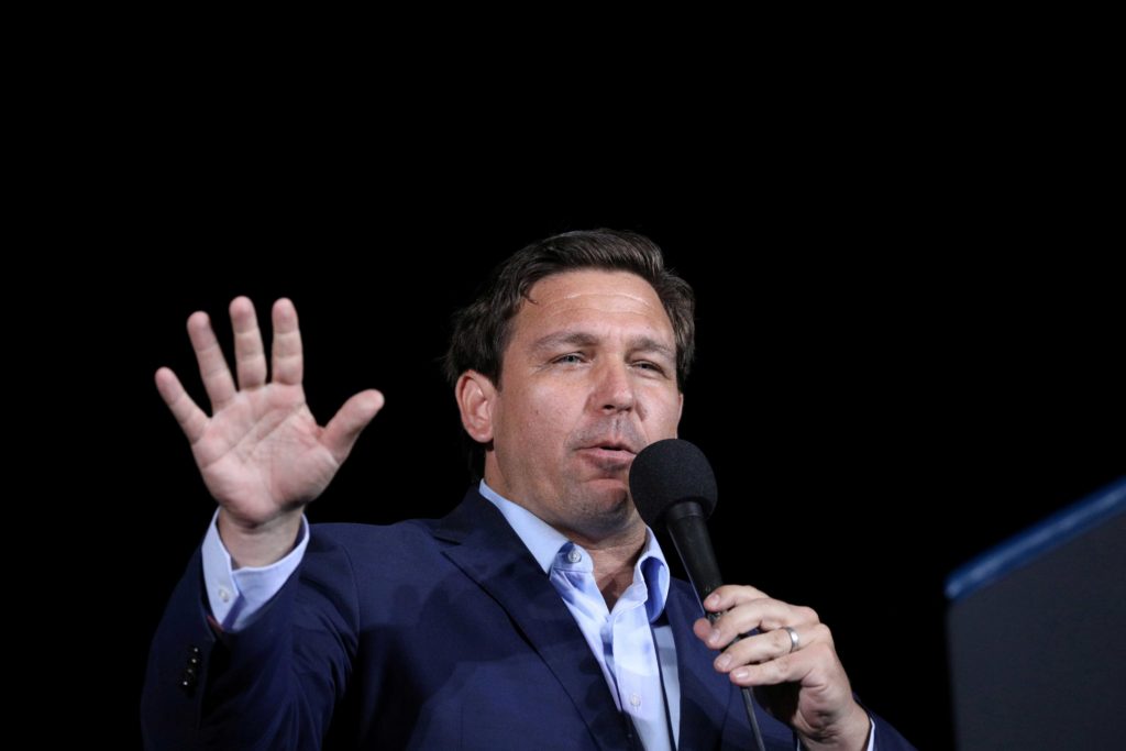 Florida Governor Ron Desantis speaks during a campaign rally by U.S. President Donald Trump at Pensacola International Airport in Pensacola, Florida, U.S., October 23, 2020. REUTERS/Tom Brenner