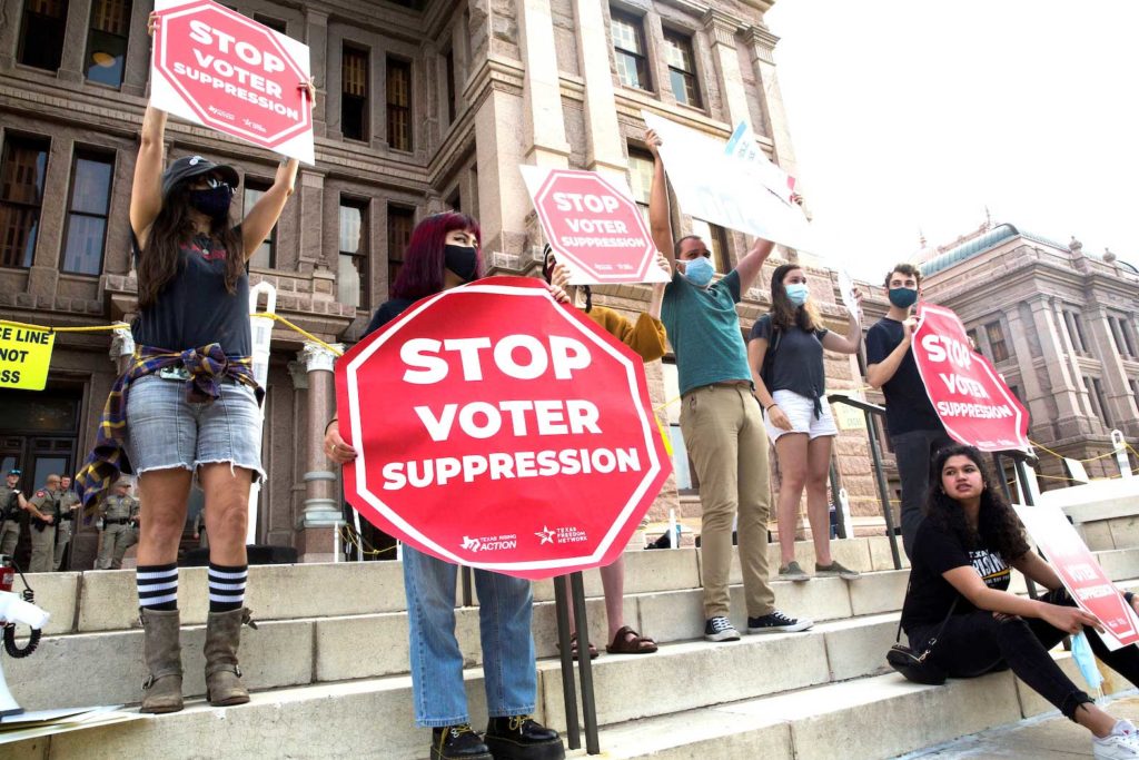 Voting rights activists gather during a protest against Texas legislators who are advancing a slew of new voting restrictions in Austin, Texas, U.S., May 8, 2021. REUTERS/Mikala Compton