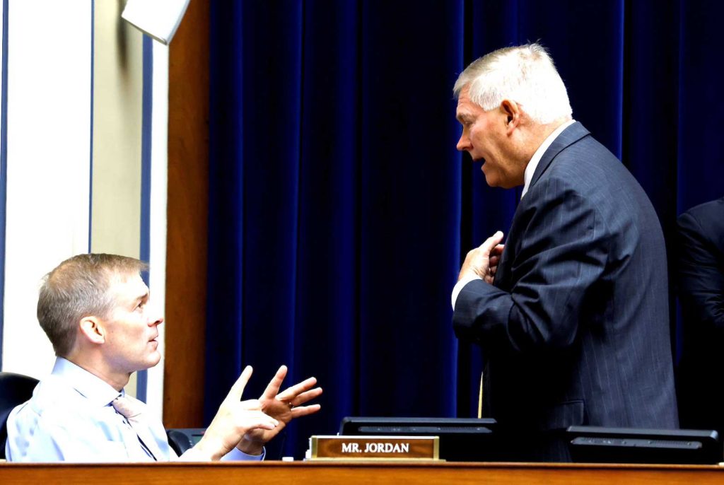 U.S. Rep. Jim Jordan (R-OH) speaks with Rep. Pete Sessions (R-TX) during a House Oversight and Reform Committee hearing titled “The Capitol Insurrection: Unexplained Delays and Unanswered Questions,” regarding the on January 6 attack on the U.S. Capitol, on Capitol Hill in Washington, U..S., May 12, 2021 REUTERS/Jonathan Ernst/Pool