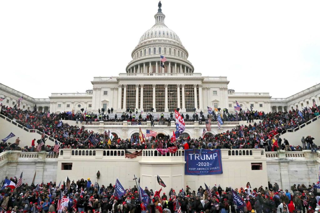  A mob of supporters of U.S. President Donald Trump storm the U.S. Capitol Building in Washington, U.S., January 6, 2021. Picture taken January 6, 2021. REUTERS/Leah Millis/File Photo