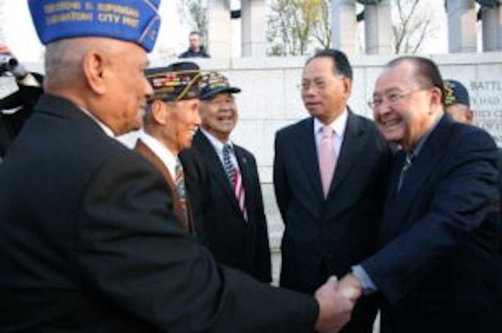 Filipino World War II veterans thank Sen. Daniel K. Inouye for championing their cause in Congress at a “Day of Valor” commemoration on April 2013 at the National World War II Memorial.
