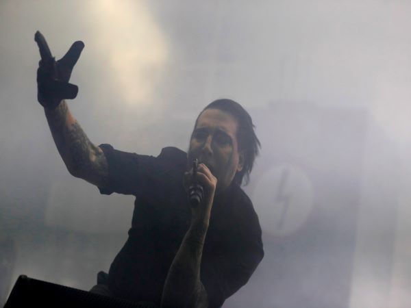 Arrest warrant issued for singer Marilyn Manson on assault charges