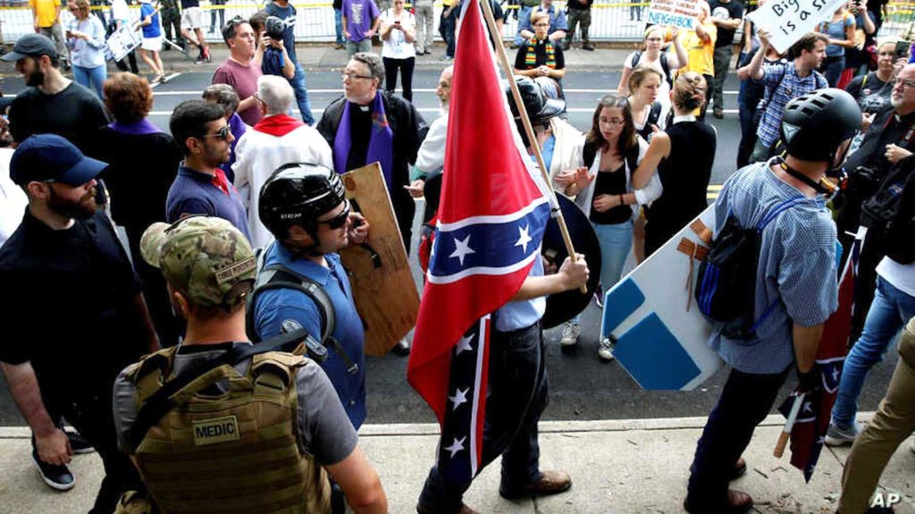 White supremacists at a demonstration. VOA