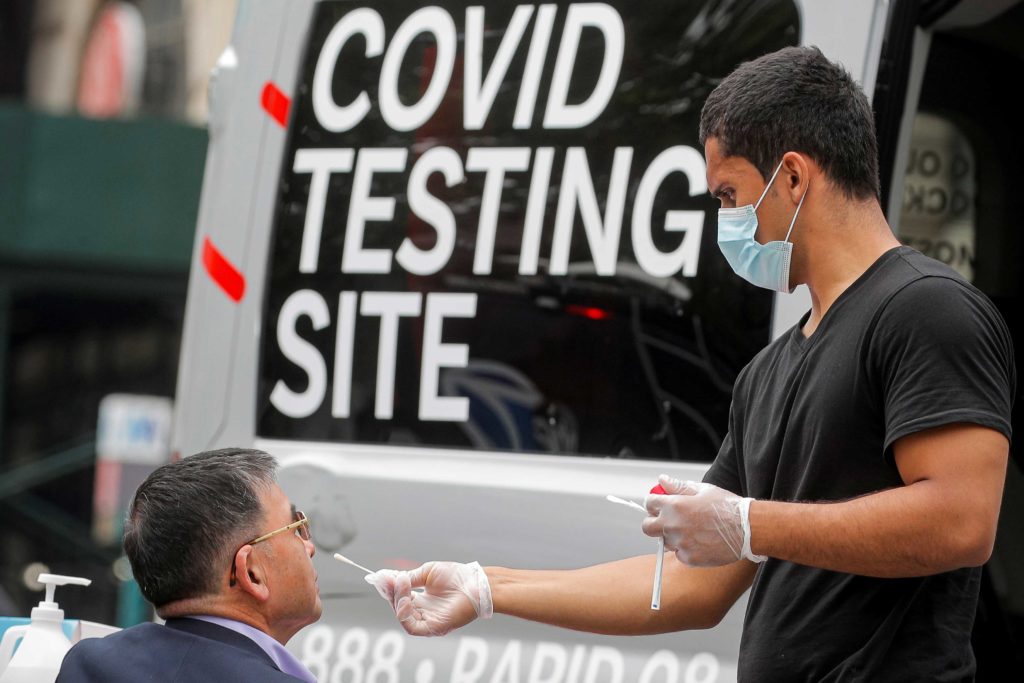  A man receives a coronavirus disease (COVID-19) test at a mobile testing van in Brooklyn, New York, U.S., June 2, 2021. REUTERS/Brendan McDermid