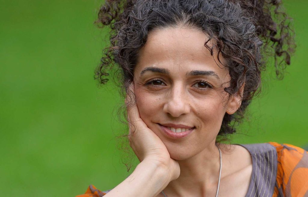 Masih Alinejad, 37, Iranian journalist, poses for a portrait in London October 8, 2013. REUTERS/Toby Melville