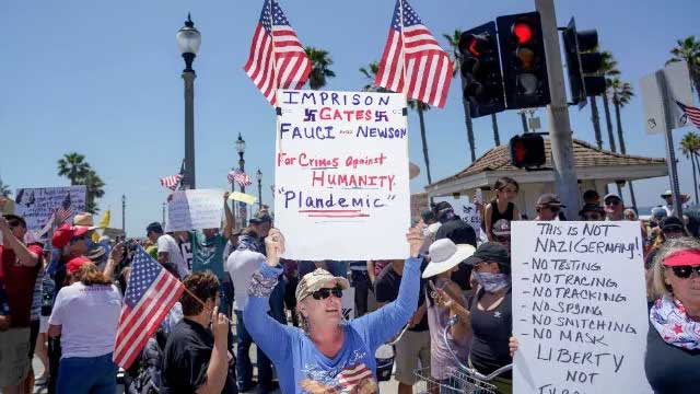 People gather near Huntington Beach Pier to protest Gov. Gavin Newsom’s lockdown order. REUTERS/Kyle Grillot