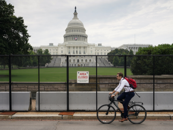 High fence around US Capitol to come down six months after Jan. 6 attack