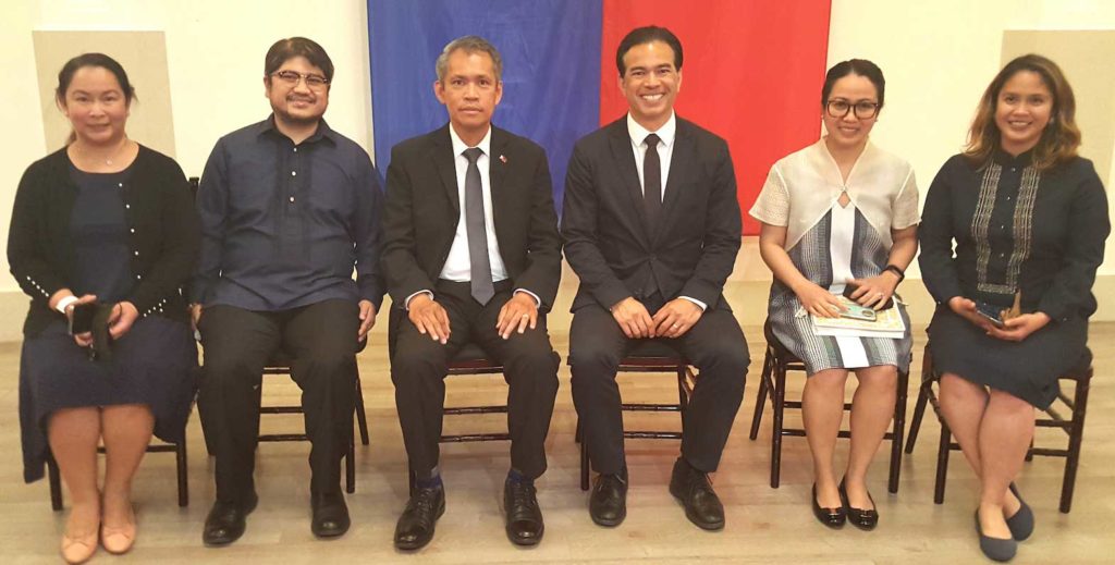 d from right) is joined by San Francisco Philippine Consulate General officials led by Consul General Neil Ferrer (third from left) for a souvenir shot after the memorial Mass. INQUIRER/Jun Nucum