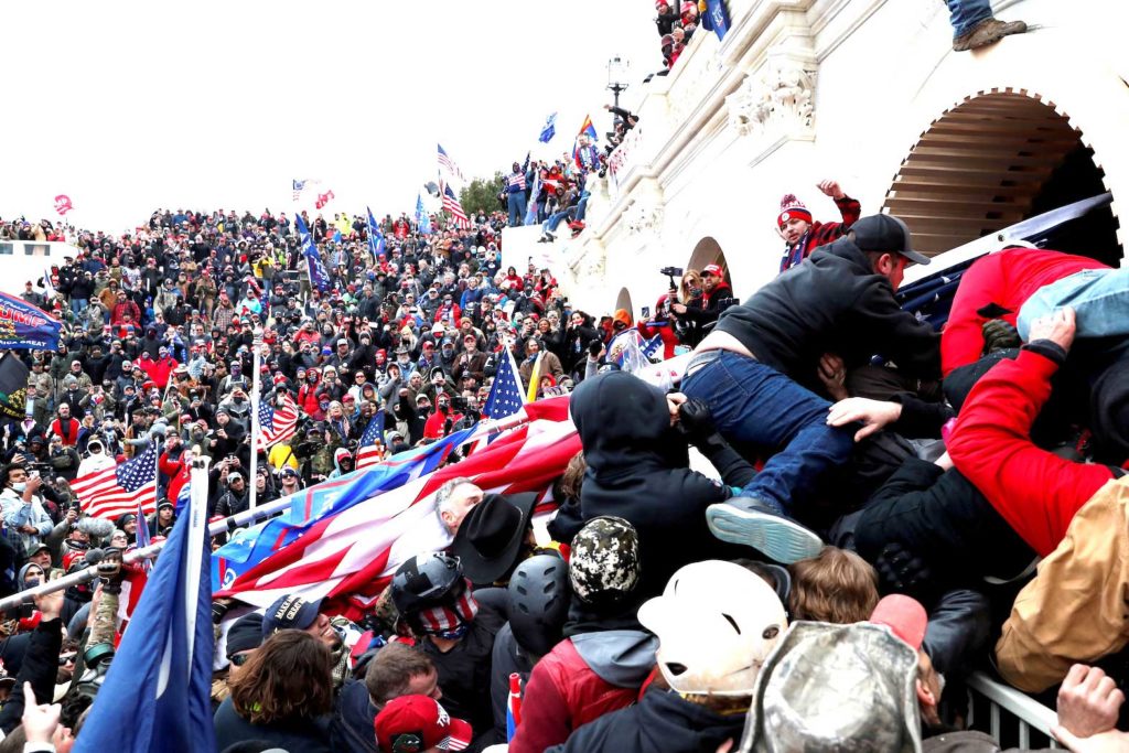 Pro-Trump protesters storm into the U.S. Capitol during clashes with police, during a rally to contest the certification of the 2020 U.S. presidential election results by the U.S. Congress, in Washington, U.S, January 6, 2021. REUTERS/Shannon Stapleton/File Photo