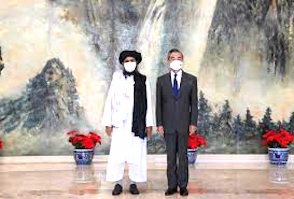 Chinese State Councilor and Foreign Minister Wang Yi meets with Mullah Abdul Ghani Baradar, political chief of Afghanistan's Taliban, in Tianjin, China July 28, 2021. Li Ran/Xinhua via REUTERS