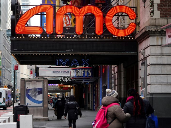 AMC shares up on minor loss and cinema window deal