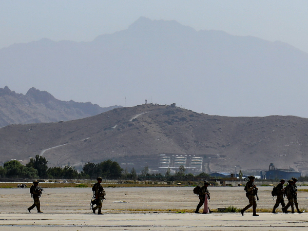 Thirteen US troops and dozens of civilians killed in Kabul airport attack