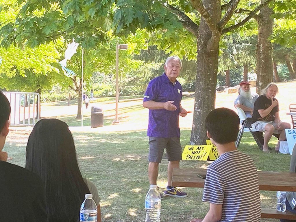 Frank Irigon at Lake Boren Park in Newcastle, speaking at an AAPI Against Hate Rally. CONTRIBUTED