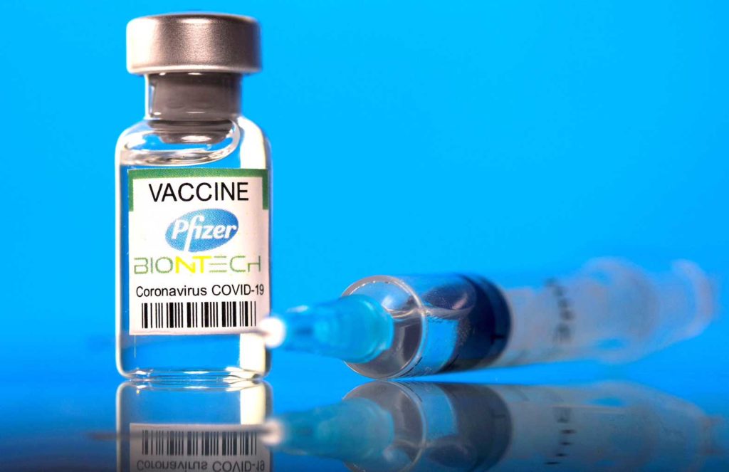   A vial labelled with the Pfizer-BioNTech coronavirus disease (COVID-19) vaccine is seen in this illustration picture taken March 19, 2021. REUTERS/Dado Ruvic/Illustration