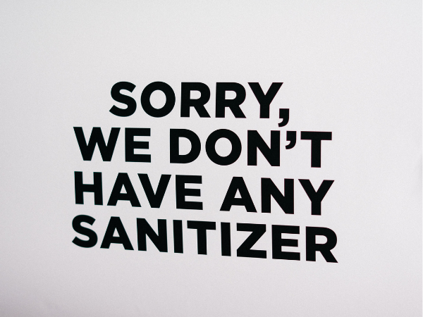 This is a sign that says "SORRY, WE DON'T HAVE ANY SANITIZER".