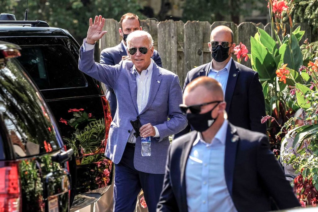 U.S. President Joe Biden departs Brew Ha Ha! Cafe and restaurant in Wilmington, Delaware, U.S., October 3, 2021. REUTERS/Ken Cedeno