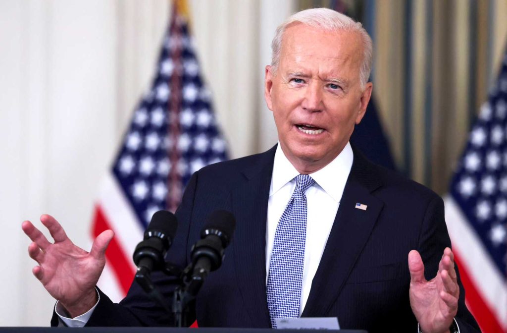 U.S. President Joe Biden responds to a question from a reporter after speaking about coronavirus disease (COVID-19) vaccines and booster shots in the State Dining Room at the White House in Washington, U.S., September 24, 2021. REUTERS/Evelyn Hockstein/File Photo/File Photo