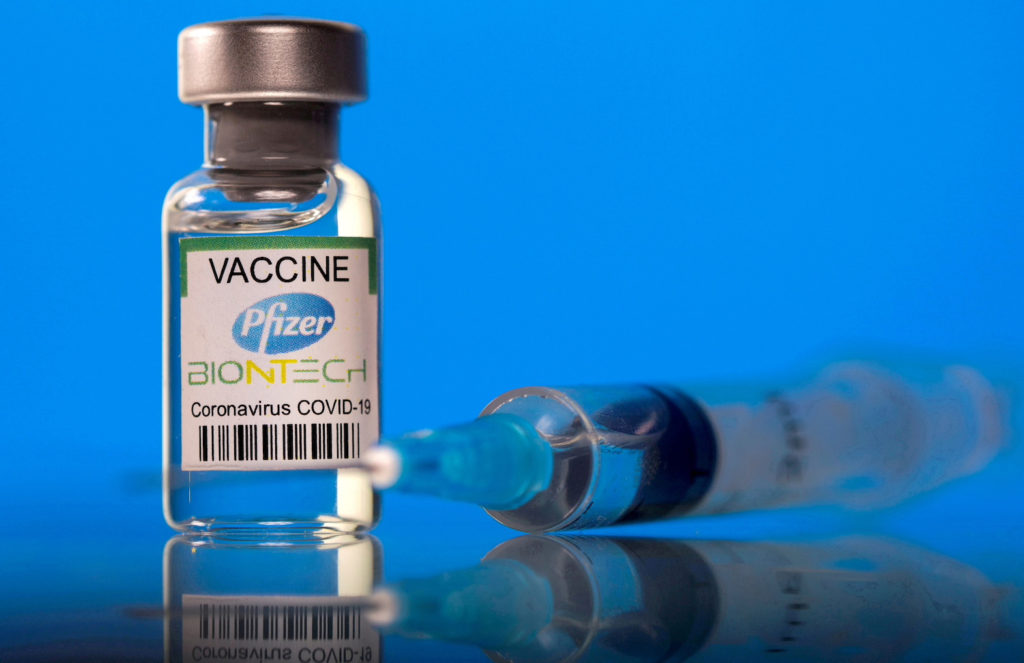 A vial labeled with the Pfizer-BioNTech coronavirus disease (COVID-19) vaccine is seen in this illustration picture taken March 19, 2021. REUTERS/Dado Ruvic/Illustration