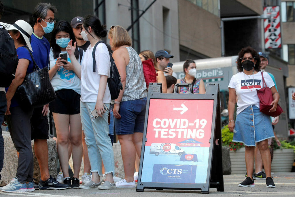 People line up at a coronavirus disease (COVID-19) testing at a mobile testing van in New York City, U.S., August 27, 2021. REUTERS/Brendan McDermid