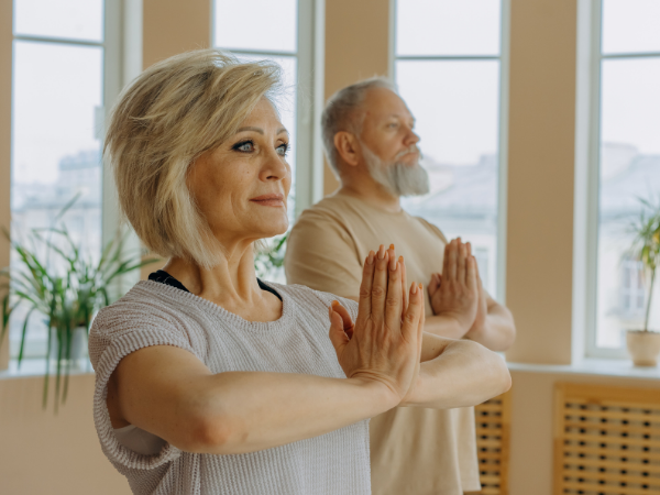 These are elderly people performing yoga.
