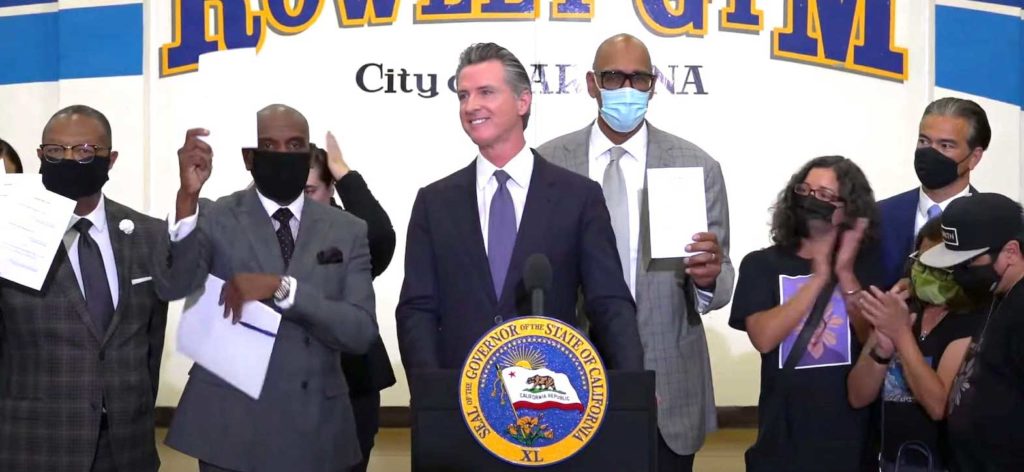 Governor Gavin Newsom on Sept. 30, 2021 signed legislation creating a system to decertify peace officers for serious misconduct. He was joined by legislators, community leaders, and families of victims of police violence.  TWITTER