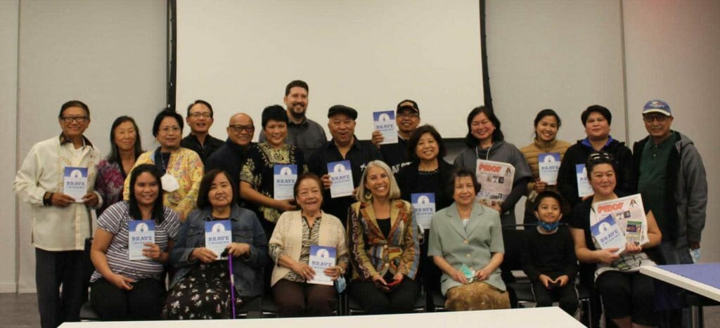 Author Maria Alvarez Stroud (seated, 4th from Left) poses with audience members during her workshop for her historical novel "Brave Crossing" Oct. 21 at the Skokie Public Library. The workshop was co-sponsored by Knights of Rizal (KOR), Pilipino American Cultural Foundation (PACF) and PINOY Newsmagazine.