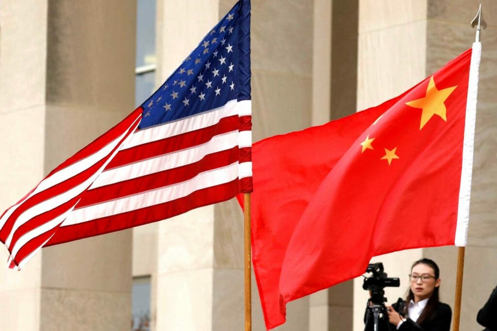 U.S. and Chinese flags are seen before a meeting between senior defence officials from both countries at the Pentagon in Arlington, Virginia, U.S., November 9, 2018. REUTERS/Yuri Gripas/File Photo