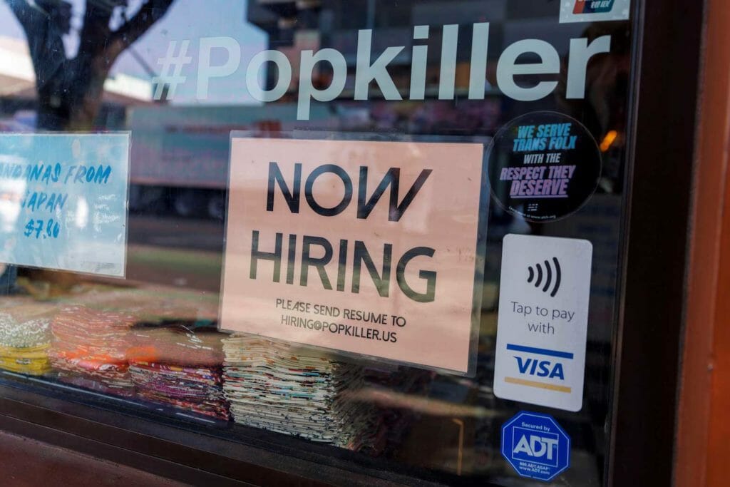  A store advertises for workers in downtown Los Angeles, California, U.S. November, 16, 2021. REUTERS/Mike Blake/File Photo